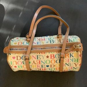 Vintage Dooney and Bourke barrel bag with rainbow signature name and zipper